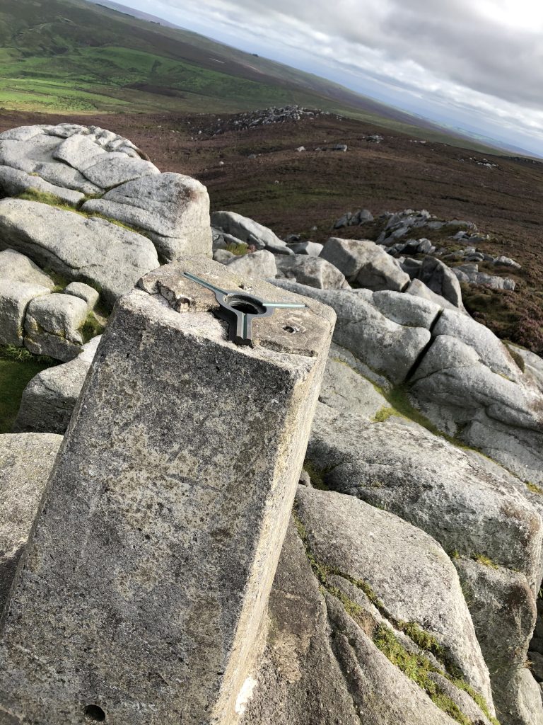 Views of the trig point on Simons Seat