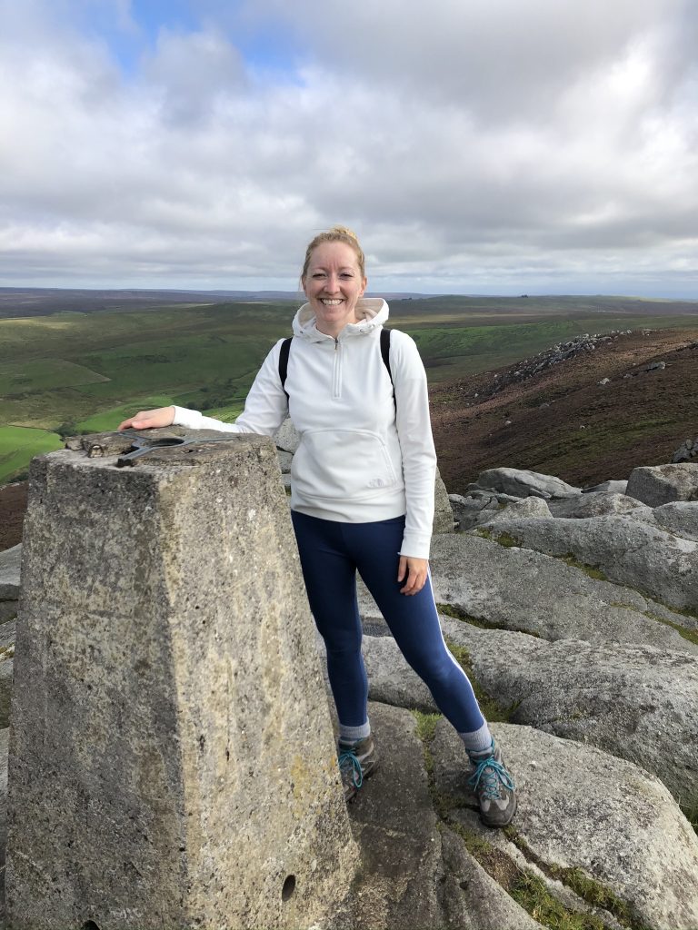 Bagging the trig point on the top of Simons seat