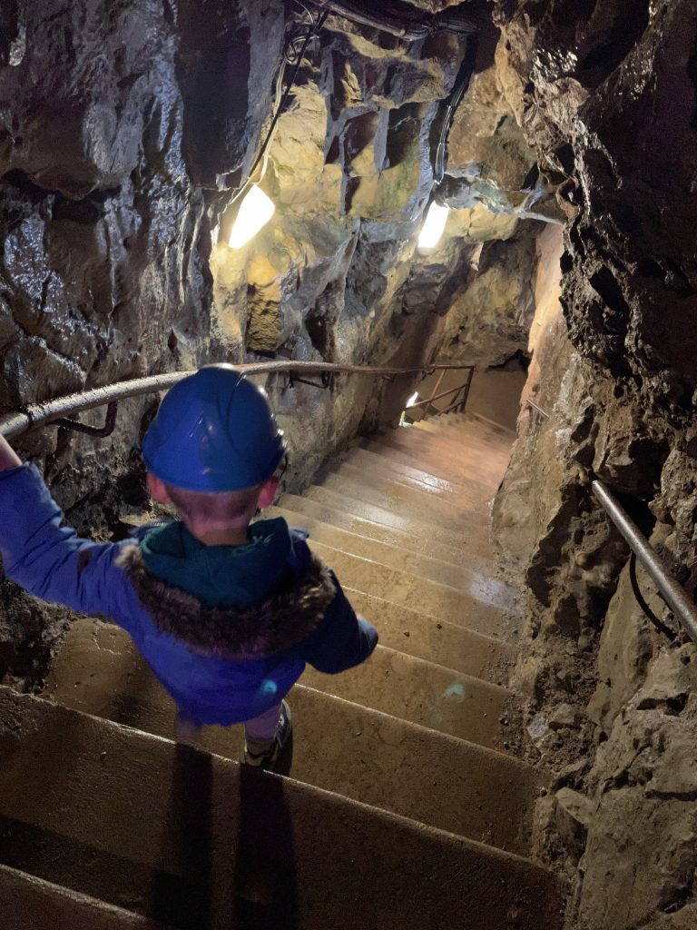 down the stairs into the caves